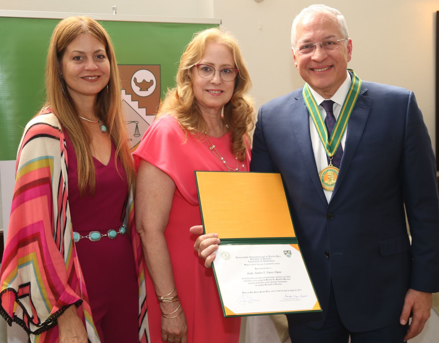 The Alumni Association of the Inter-American University of Puerto Rico’s School of Law honored Carlos E. López López at the 2023 Distinguished Alumni event held May 5, 2023. In the photo appears, to the left of Mr. López, Ms. Sheila Gómez, Director of Development of the Inter-American University of Puerto Rico’s School of Law, and Ms. Margie Vega Braña, Esq.,  President of the Alumni Association of the Inter-American University of Puerto Rico’s School of Law. 
